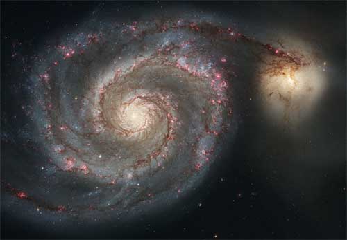 M51 © NASA, HST alt=